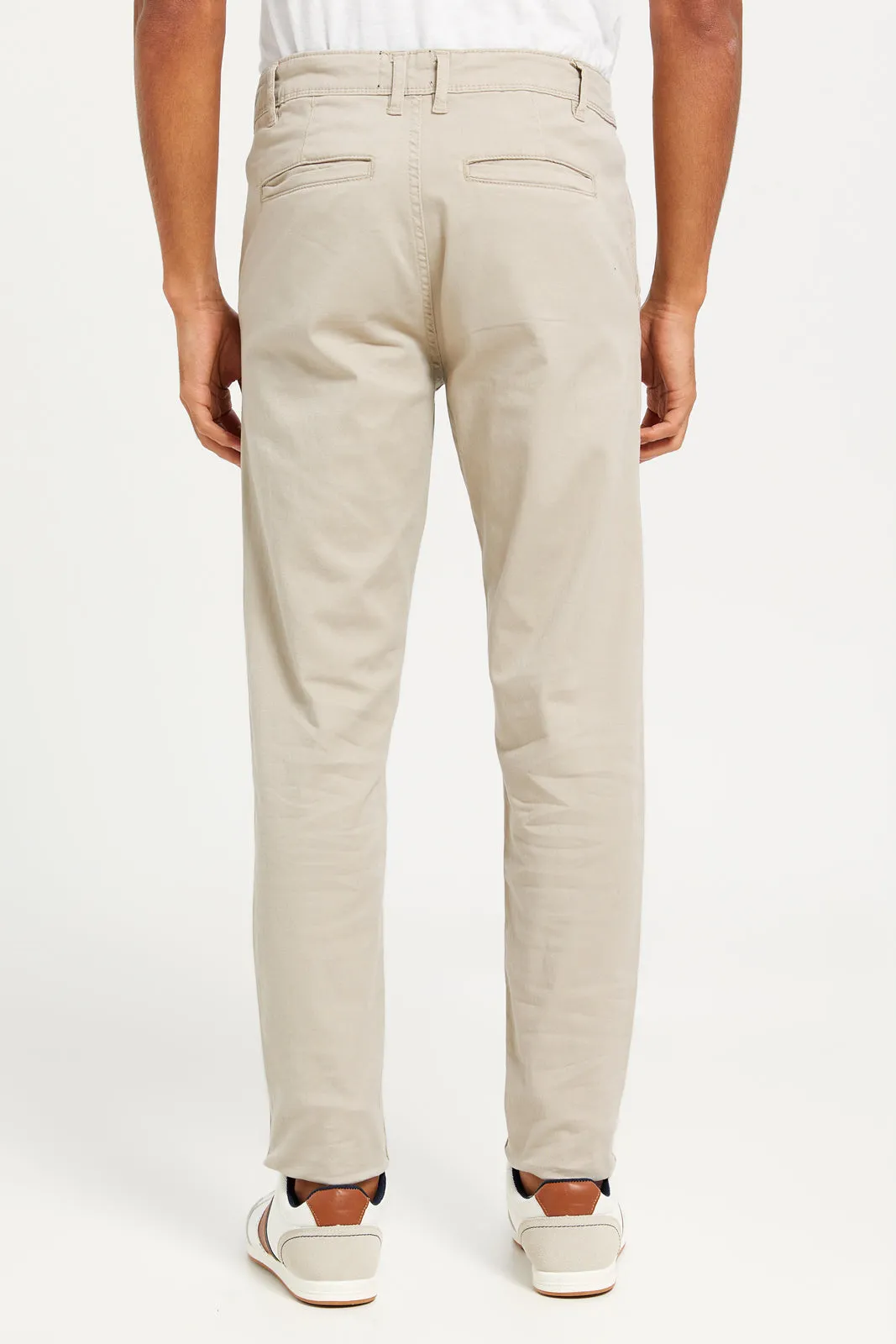 Men Beige Solid Chino Trousers