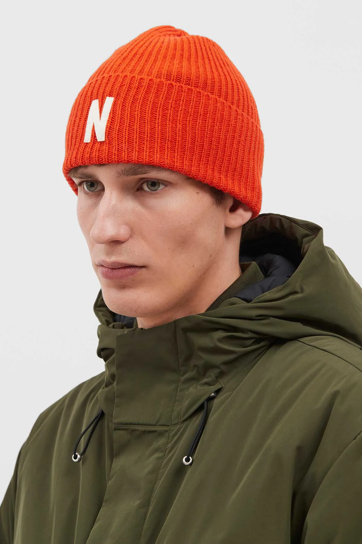 Norse Projects Merino Lambswool Rib N Logo Beanie in Blood Orange