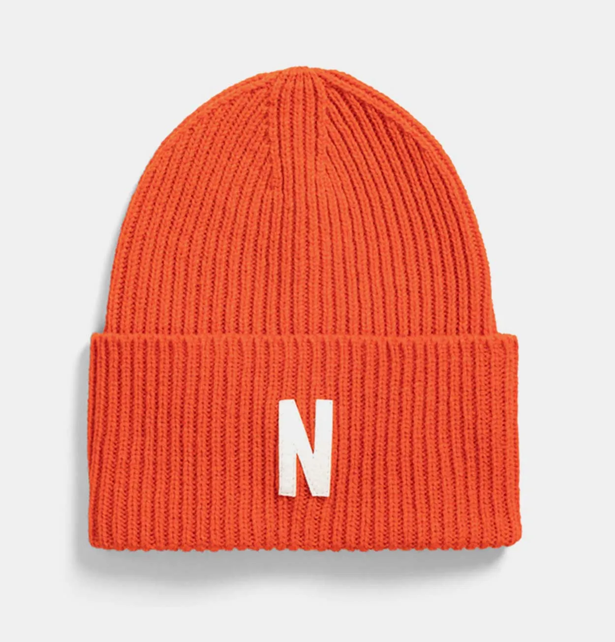 Norse Projects Merino Lambswool Rib N Logo Beanie in Blood Orange